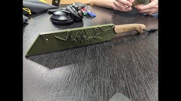 Hand forged knife with 3D printed sheath.