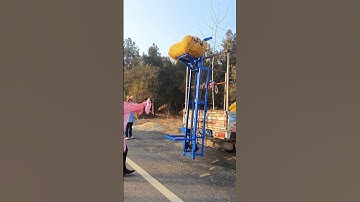 24V bale lifter loads bales while walking #double chain bales are easily loaded on large vehicles