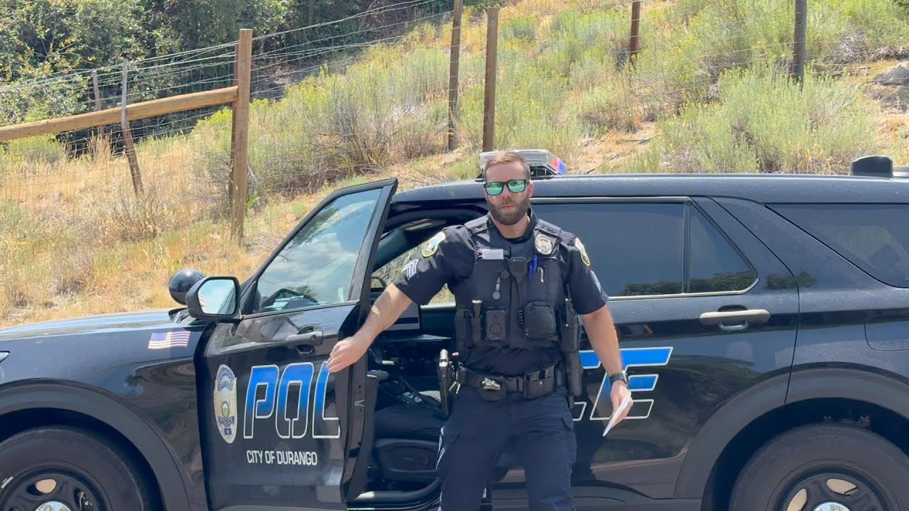 Cop Watch on Avenida Del Sol, Durango, Colorado, August 12, 2025