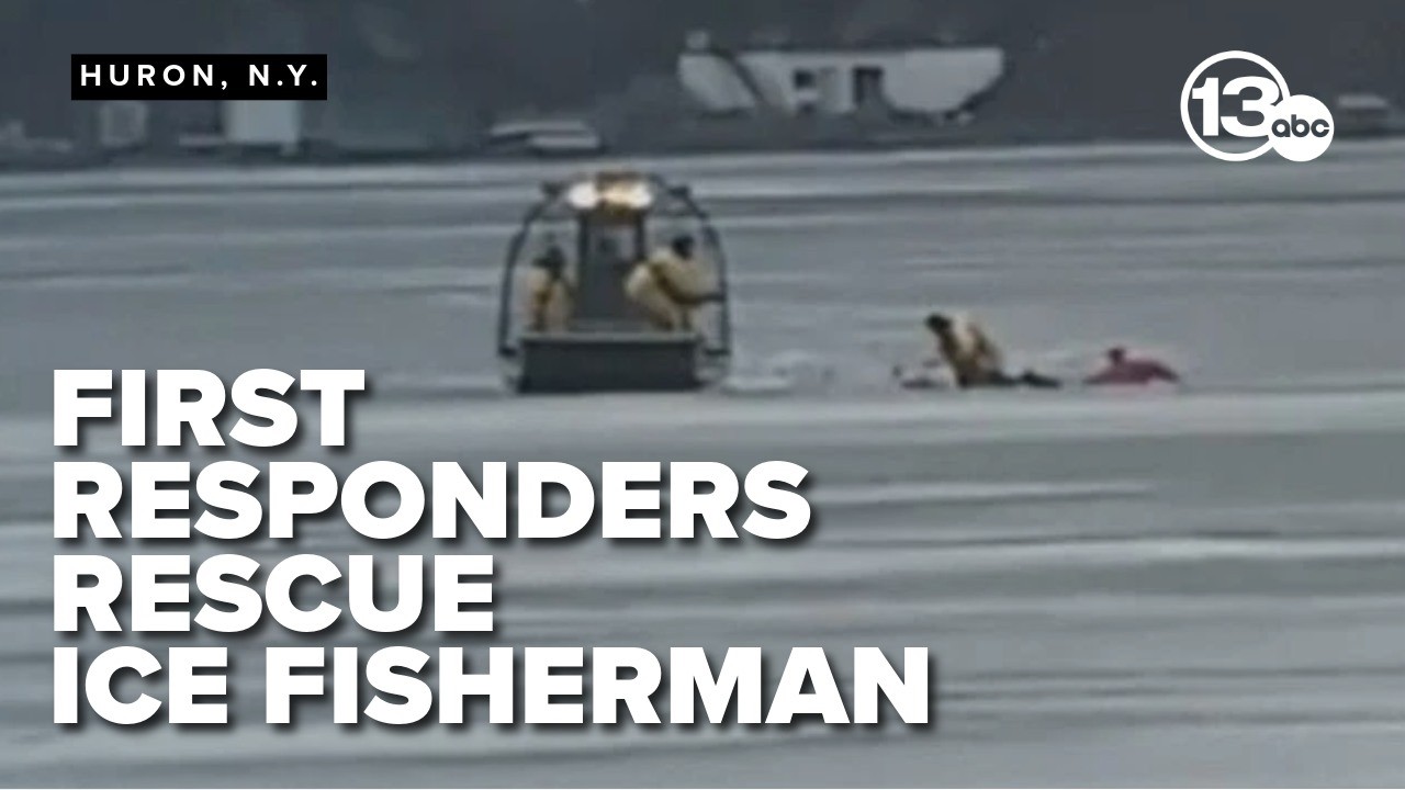 Fisherman rescued after falling through ice - YouTube