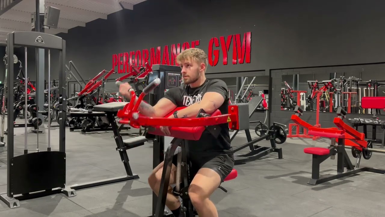 Single arm preacher curl machine