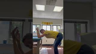 Lat stretch at table (standing or kneeling)