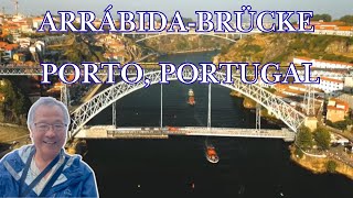 Sonnenuntergang und moderne Musikershow auf der Arrabida-Brücke vor dem Weihnachtstag 2024.