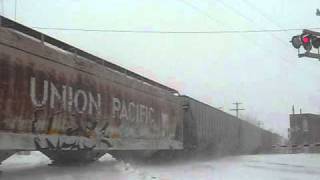 Must See! Blizzard Conditions, whipping snow, and a UP Train!!