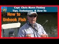 How to remove a fish hook using a dehooking tool