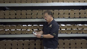 Nick Perdomo Checks the Humidity Level of the Cigars in The Aging Room Before Color Sorting
