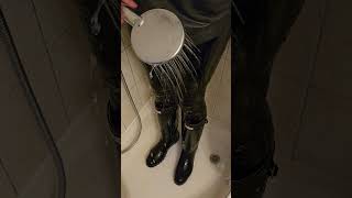 vinyl and boots under shower