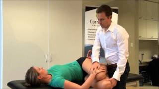 Physio Exercise - 2 Leg Lumbar Flexion Rotation In Lying