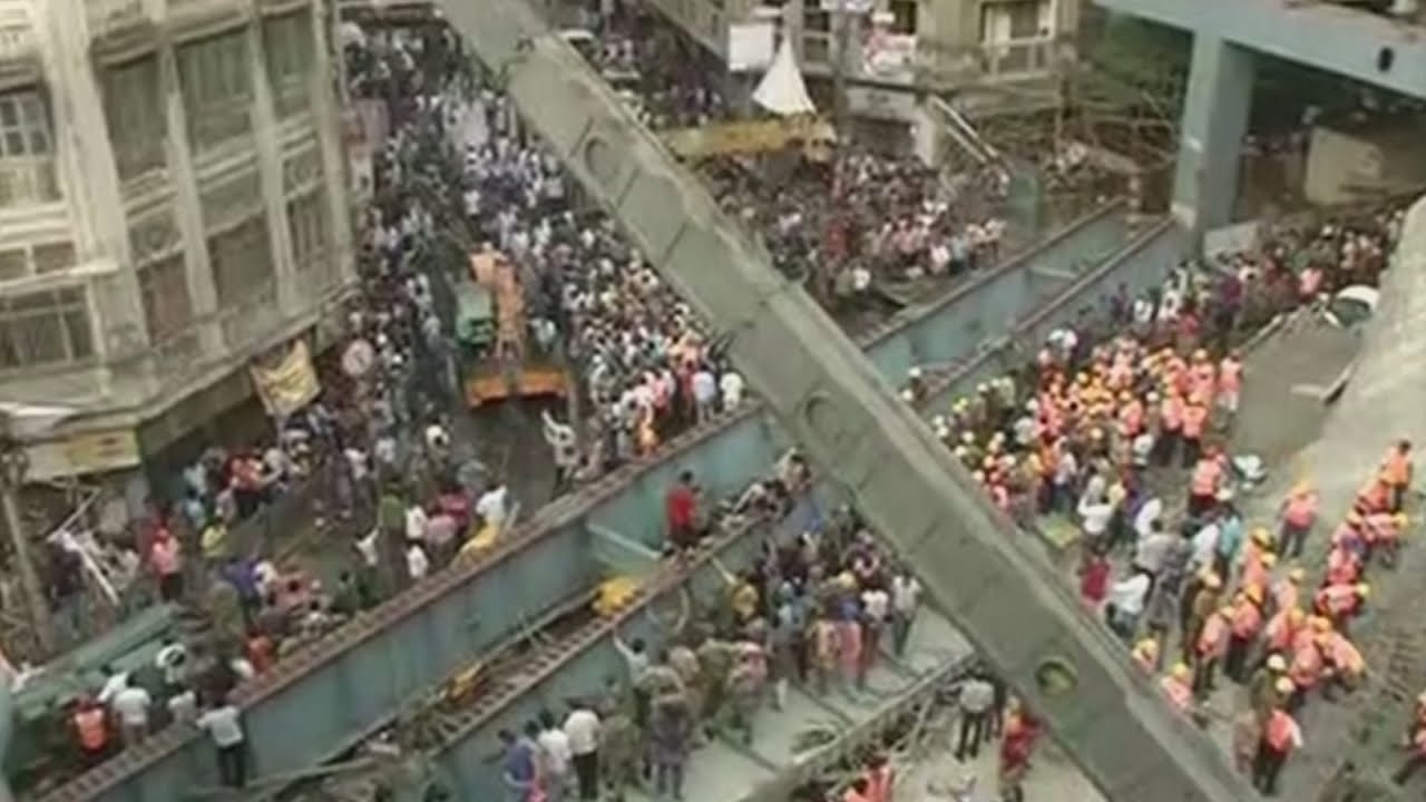 Several killed in Kolkata flyover collapse with hundreds trapped - YouTube