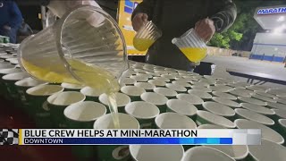 Blue Crew helps out at 500 Festival Mini-Marathon