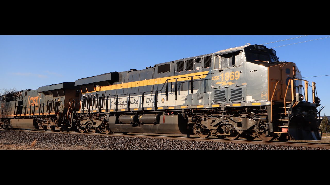 CSX 1869 Chesapeake and Ohio heritage unit on L303 in Michigan December 21, 2025 