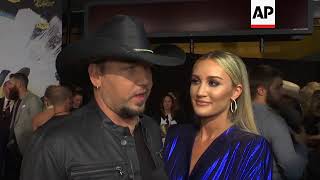 Carrie Underwood lights up CMT carpet