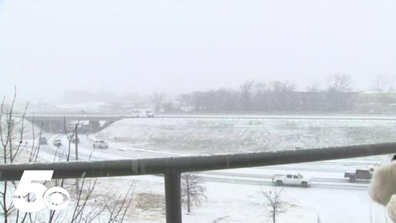 Monitoring road conditions as snowstorm blows in - YouTube