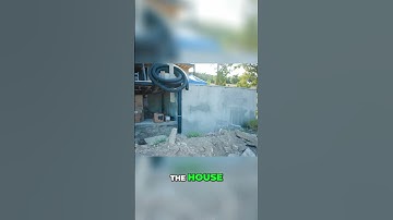 Building Hack - How to Deal with Exposed Concrete Walls on Sloped Properties
