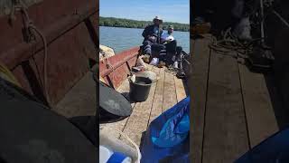 Large Fish Leaps From Water, Lands Directly In Boat