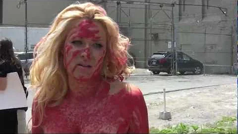 PETA's human meat tray protest at Toronto's Qualit...