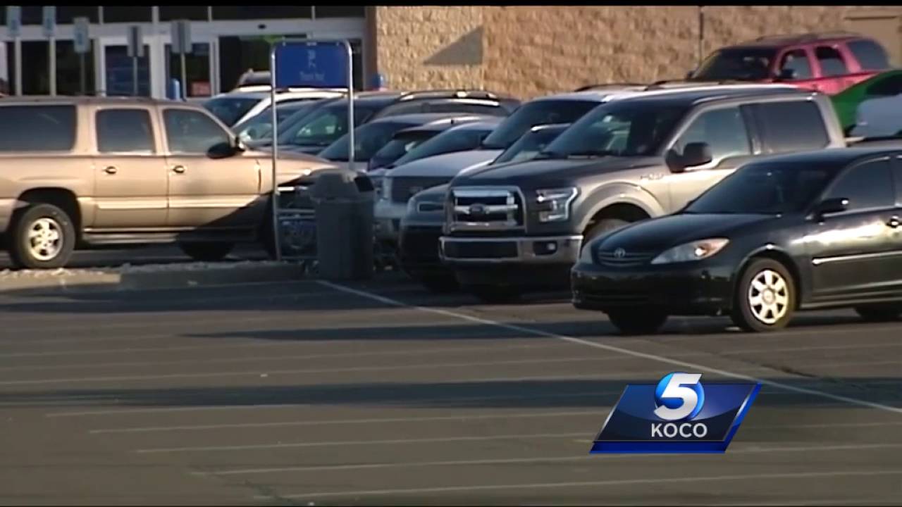 Mother arrested after leaving children in locked car while shopping ...