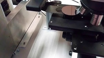 Semiconductor wafers automatic loading for a Nikon LV150 microscope with  with end effector rotation