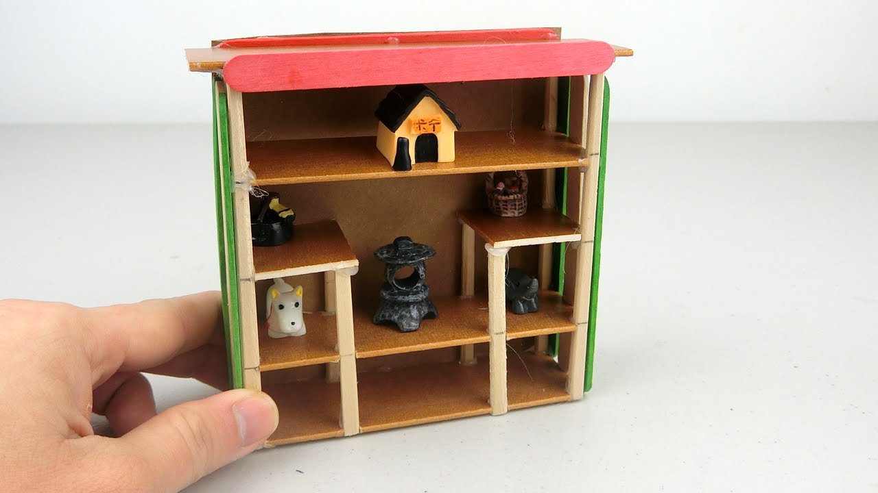 doll house made of popsicle sticks