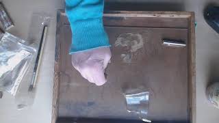 Traditional, lacquer based kintsugi, applying metal to glass lacquer