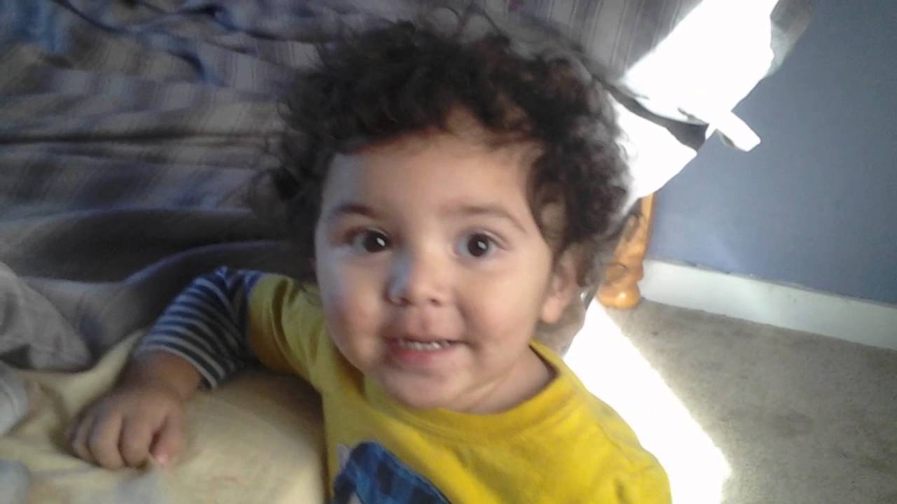 Funny , curly hair baby 