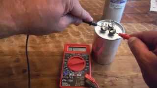 how to test a dual run capacitor from air conditioner with a multimeter