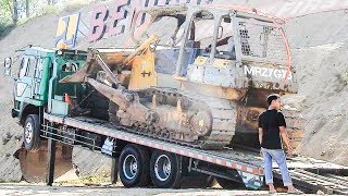 BIG Dozer Moved By Fuso Self Loader Truck