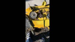 How to put the deck belt on a John Deere LA 115