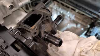 2011 Chev Aveo Thermostat Housing and Cooling Fan Resistor Replacement pt2