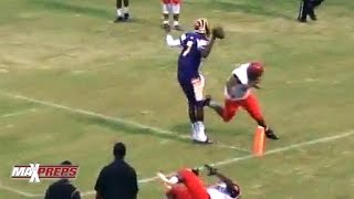 Louisville recruit Lamar Jackson walks into the end zone