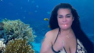 Busty Brunette Smoking a Joint "Underwater"