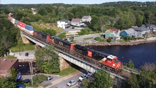 Awesome Aerial 4K View!  Huge Stack Train CN 120 w/DPU Crossing Over Sackville River at Bedford, NS