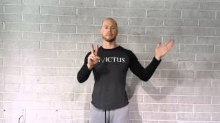 Wall Handstand Thigh Taps with Invictus Athlete coach Travis Ewart