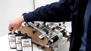 Label Applicator for Flask Bottles