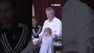 Newsom holds mock bill signing with kids