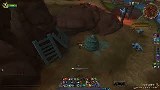 Where kodos take rest. Past gate marked with bone and fire. Dig near the hay bale. - Riddle, WoW