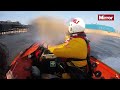 Boys rescued at sea just seconds from death by RNLI – as screaming mum can't reach them