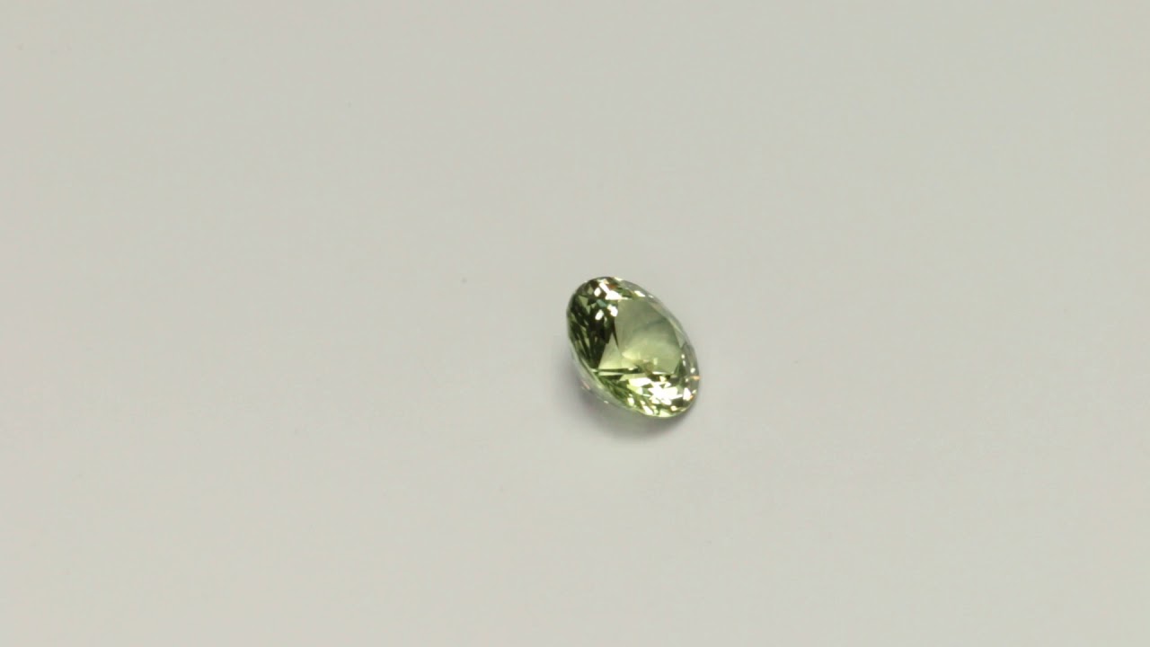 0.547 Carat Yellow Green Sapphire Excellent Cut Round 5 mm Calibrated Heated Loose Stone