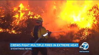 Firefighters face dangerous temps while battling double brush fires in Santa Clarita