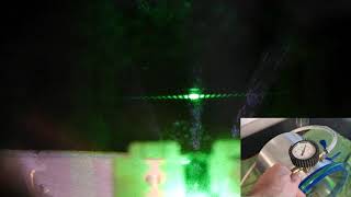 laser diffraction pattern with varying air pressure
