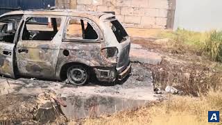 Coche incendiado en el inmueble desalojado por los okupas en A Garrida