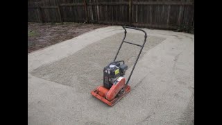 Plate compacting crushed gravel