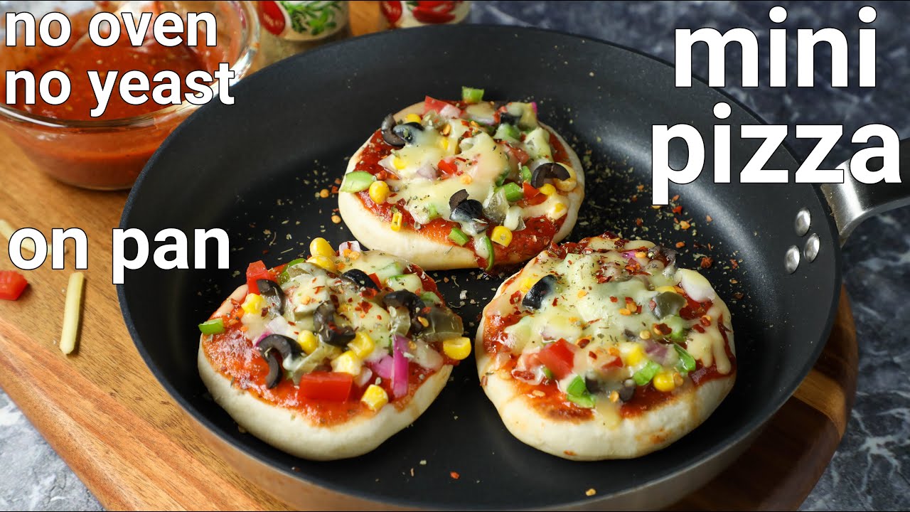 mini pizza recipe on tawa with instant homemade pizza sauce | pizza mini recipe with pizza sauce | Hebbar | Hebbars Kitchen