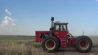 Vintage Versatile 700 going down the road.
