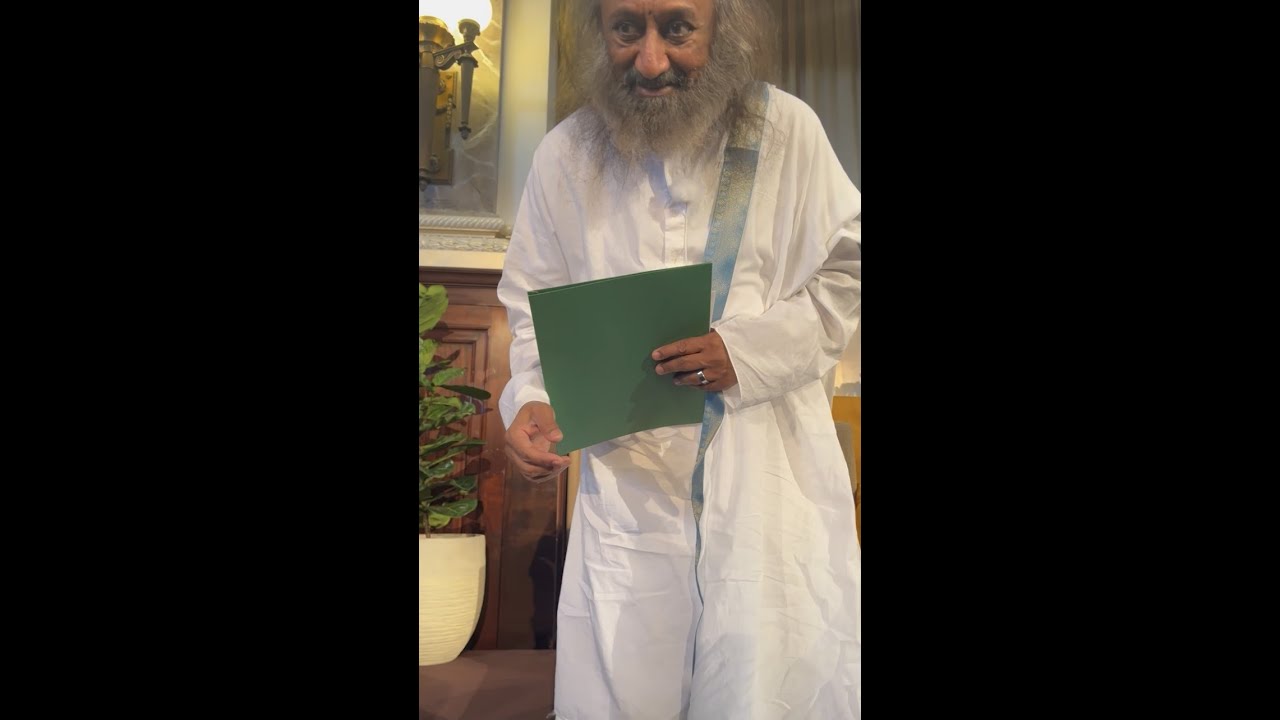 Author Leonard Clifton giving Guru Sri Sri Ravi Shankar Signed Copies of Atlantis Chronicles