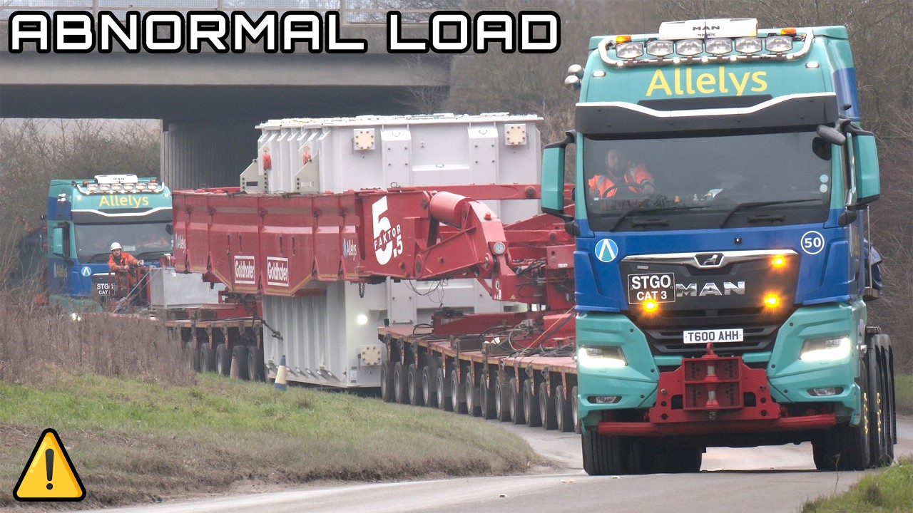 Very heavy 571 tonne transport with 248 wheels gets a police escort for Wind Farm Project