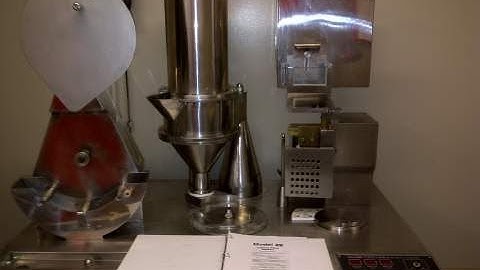 Video about YX series semi-automatic capsule filling machine  pharmaceutical pills filling equipment