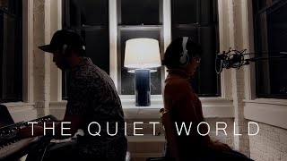 A reading of the poem 'The Quiet World' accompanied by piano