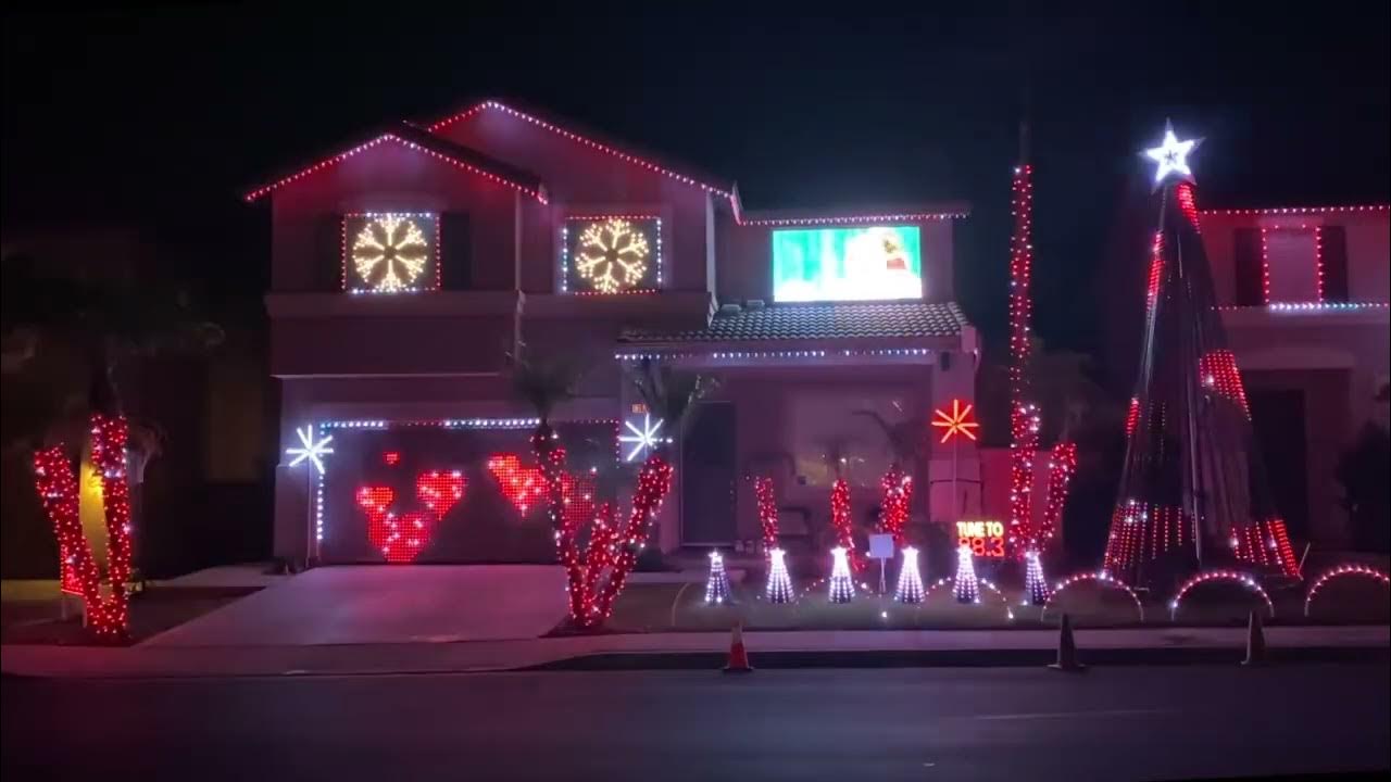 Christmas Lights Dancing to "You make it feel like Christmas". YouTube