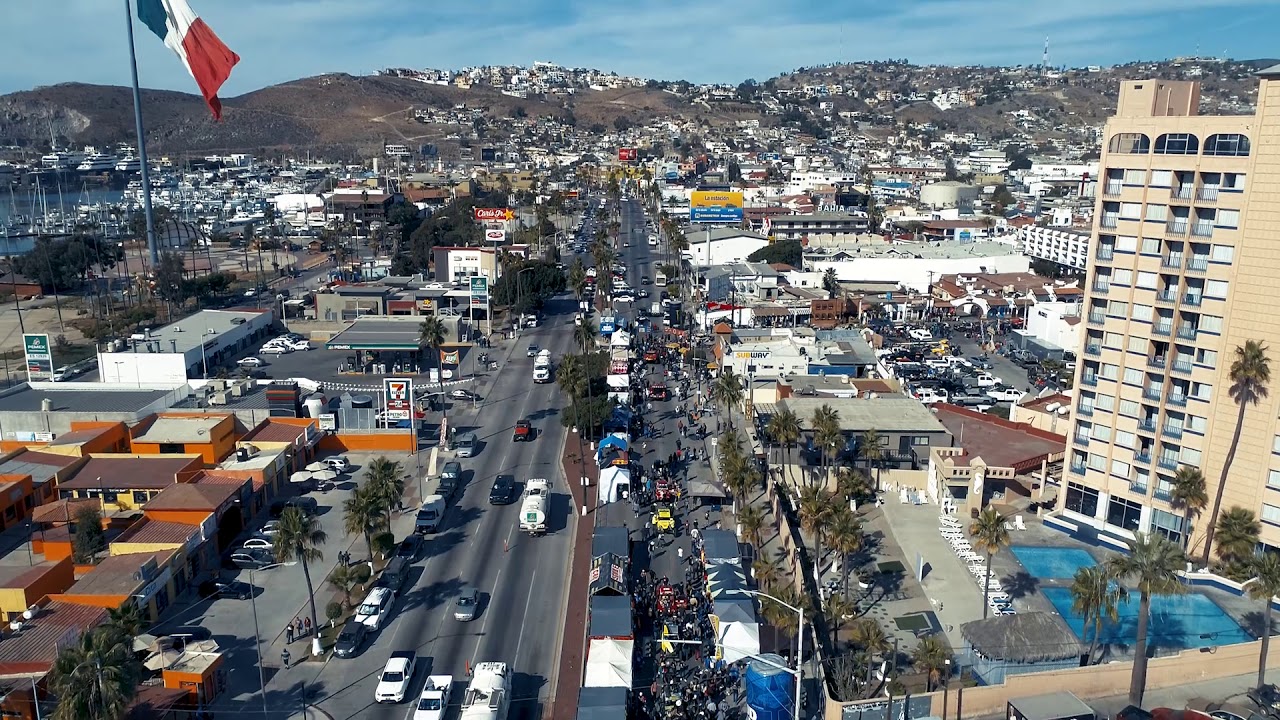 Drone footage of crowds at "contingency day" at the Baja 1000